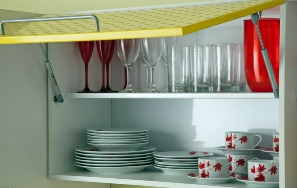 plates, glasses and cups in cabinet