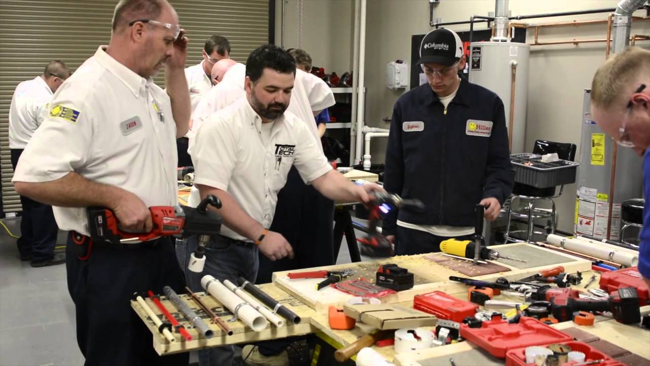 men teaching plumbing 