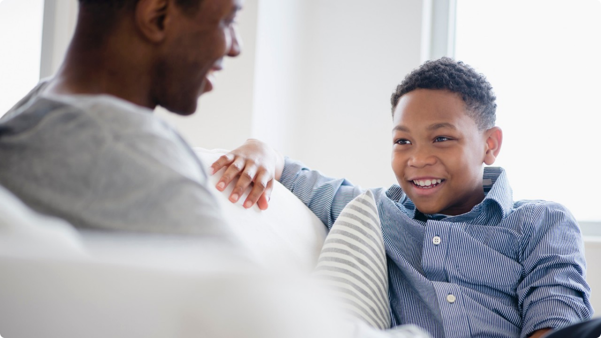 father talking to his son