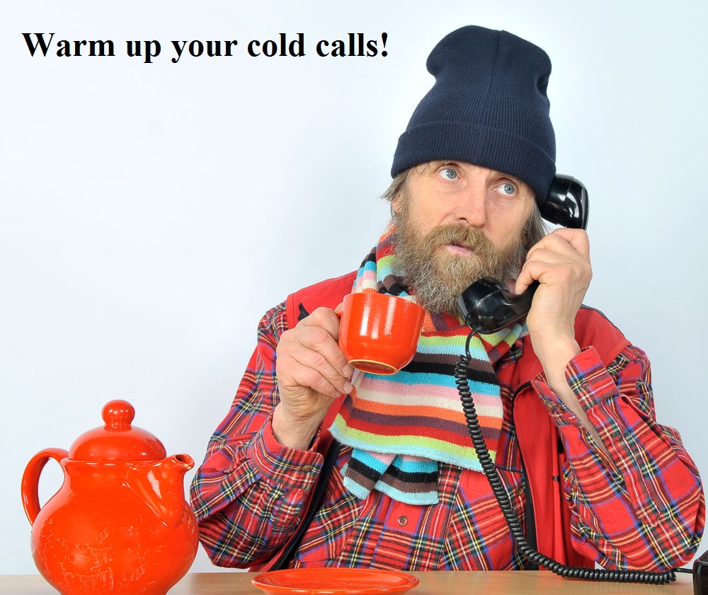 warm up cold calling man in hat with cup of tea calling