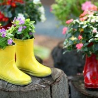 flowers planted into wellington boots diy garden decor