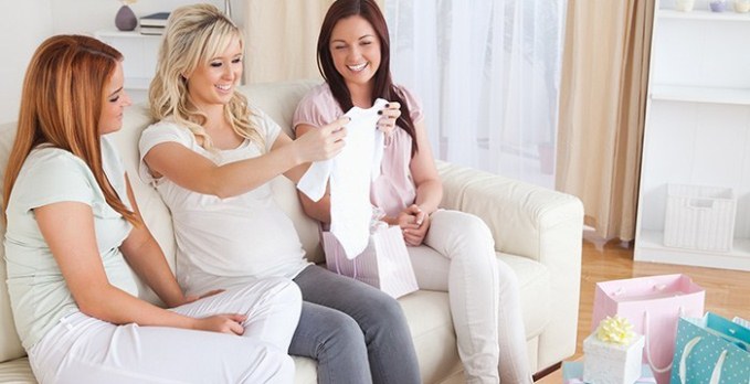 baby shower woman opening presents