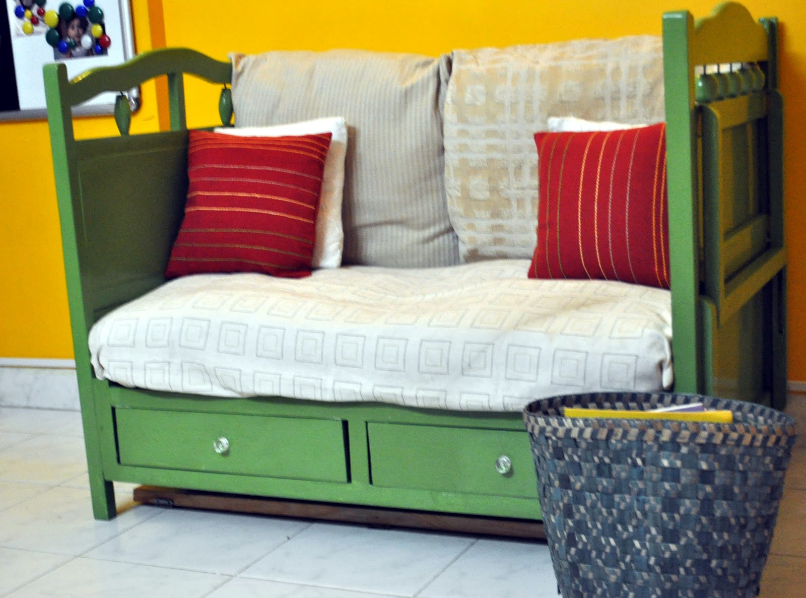 old crib remade into a garden sofa