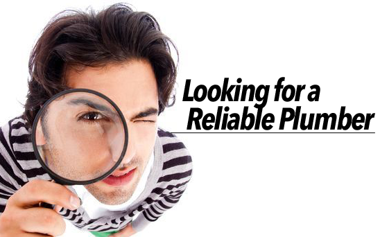 person with a magnifire looking for a reliable plumber