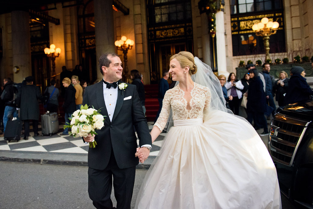 bride and groom waling and looking at each other wedding photography