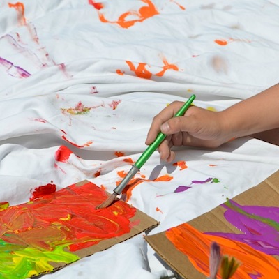 painting on a bed sheet