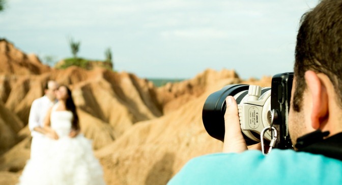 wedding photographer taking a picture