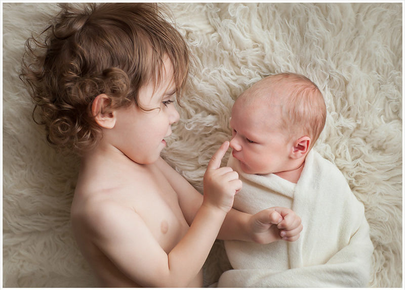 exapmle of newborn photography swaddled baby and a toddler