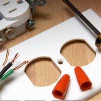 outlet, wires and screwdriver