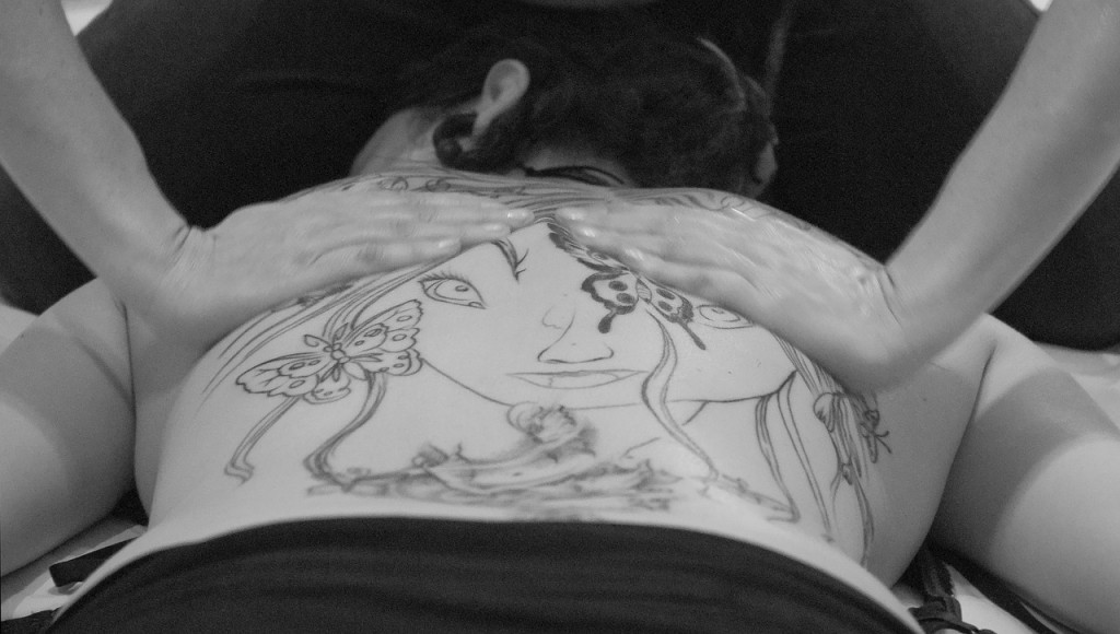 woman tattoo back