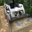 Photo #11: **Grading top soil excavation  ^^^ skid steer work
