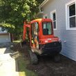 Photo #14: **Grading top soil excavation  ^^^ skid steer work