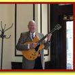 Photo #1: Instrumental Mature Style Guitarist for Elegant Events