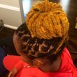 Photo #4: Loc Retwists, Repair & Style!! Call today!