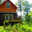 Photo #1: Professional Staining, Pressure Cleaning, and Log Cabin Repair/Restore