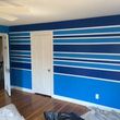 Photo #1: Professional painter/drywall repairs
