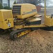 Photo #1: Stump grinding. Grinder has tracks!