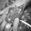 Photo #1: Eyebrow Threading + Henna Tattoos. Sola Salon