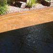 Photo #2: Concrete Dynamics - PATIOS, DRIVEWAYS, STAINING AND MORE