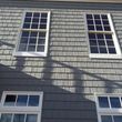 Photo #1: Siding, windows, gutters