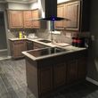 Photo #4: Junior custom construction. Kitchen cabinets & granite