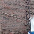 Photo #1: Brick Pointing - Stucco - Parging, Chimney and Foundation