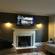 Photo #1: We hang TV's, We hang Projectors. We wire surround sound systems