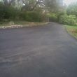 Photo #1: Asphalt Artist. We repair the Old or lay New