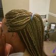 Photo #19: Women braids professional. Sew-ins (with braids) $50.00