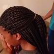 Photo #18: Women braids professional. Sew-ins (with braids) $50.00