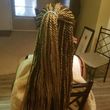 Photo #4: Women braids professional. Sew-ins (with braids) $50.00