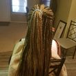 Photo #3: Women braids professional. Sew-ins (with braids) $50.00