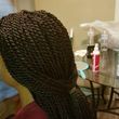 Photo #1: Women braids professional. Sew-ins (with braids) $50.00