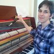 Photo #1: Expert Piano Tuner. You'll be happy to have in your home!