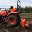 Photo #1: Small Acreage Tractor Services, Mowing, Garden Rotoilling  and Discing