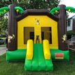 Photo #1: TROPICAL HUT BOUNCE HOUSE