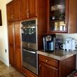 Photo #6: RE-STAIN-- THOSE OLD CABINETS