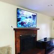 Photo #18: Tv mounting wallmount included