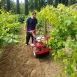 Photo #6: Rototilling lawns and weeds or gardens at your Service!