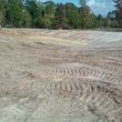 Photo #2: **PONDS, LAKES, HEAVY LAND CLEARING, AND FENCE BUILDING